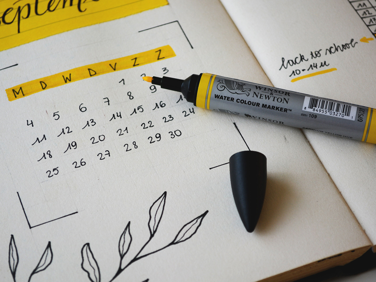 Calendar of September highlighted in yellow highlighter