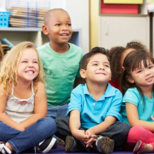 kids smiling in a classroom