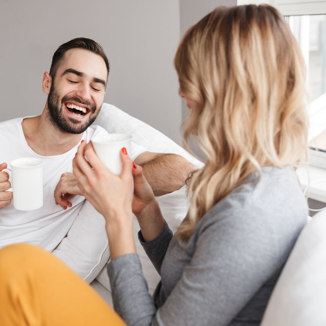 parents relaxing on couch