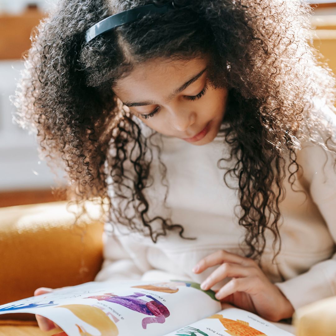 child looking at book