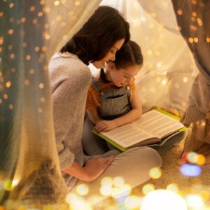 mom and daughter reading together