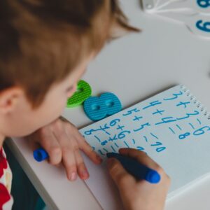 child working on math