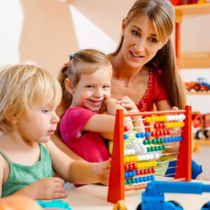 a girl on her mothers lap learning to count
