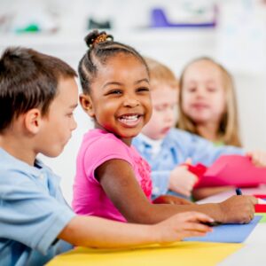Children looking happy and smiling.