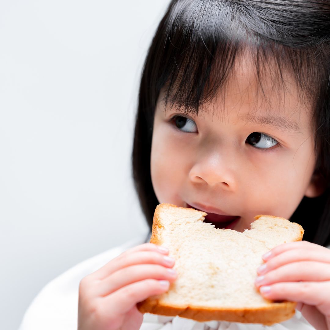 girl eating sandwich