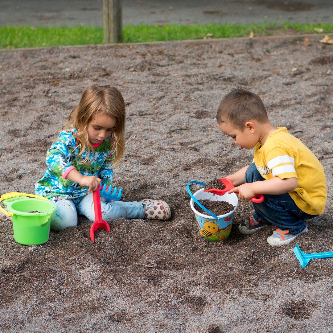 kids playing in the sand